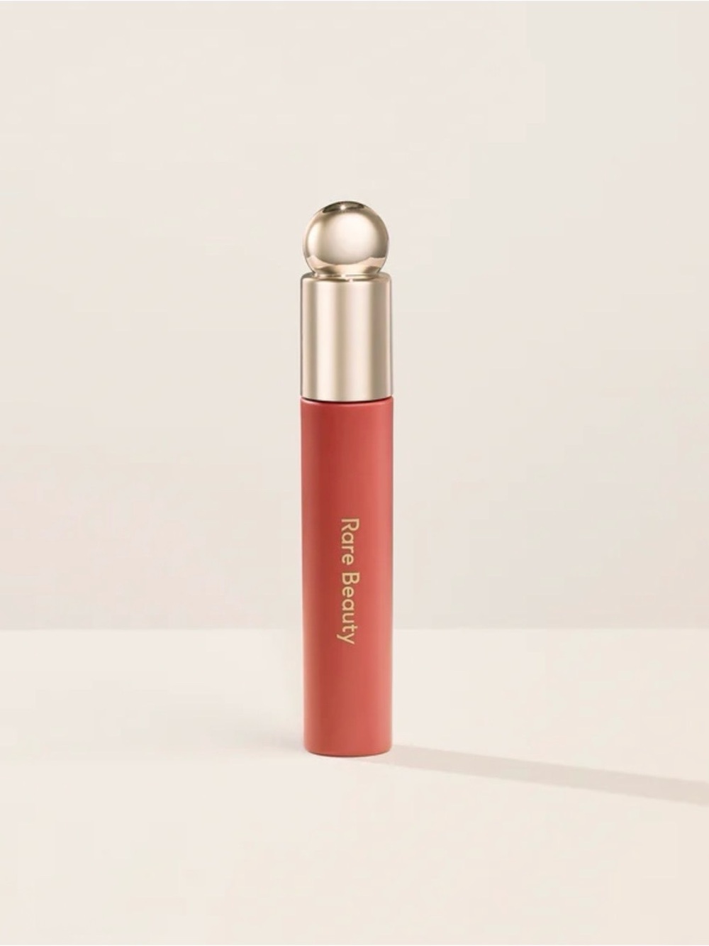 Rare Beauty soft pinch lip oil in JOY